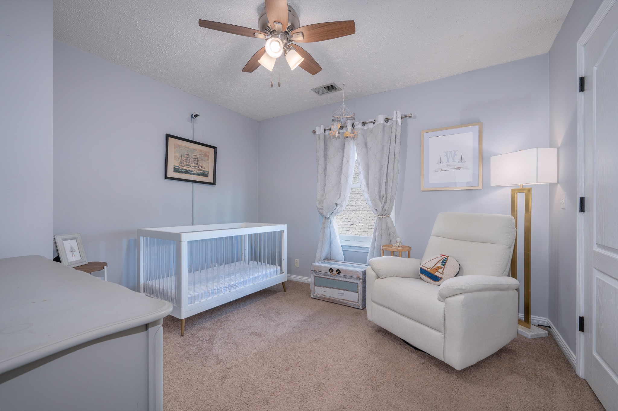 2763 Rosedale Place Nashville, TN 37211 - Photo 21 of 40 a living room with furniture and a baby crib