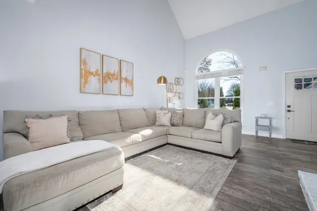 a view of entryway and hall with dining room