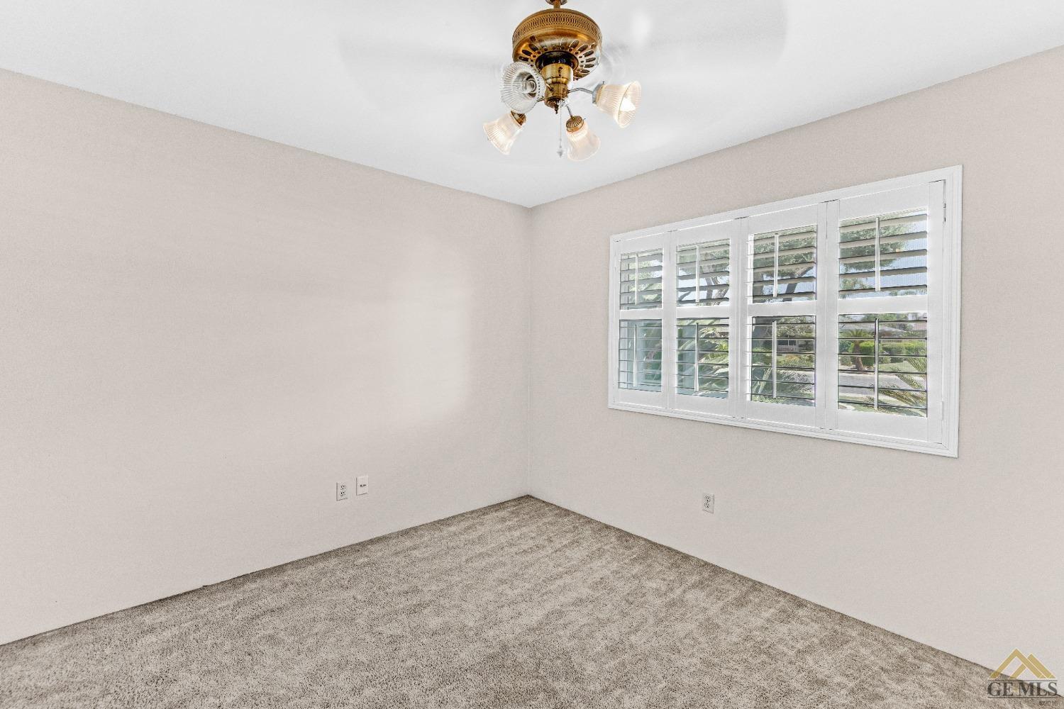 Undisclosed Address Bakersfield, CA 93311 - Photo 12 of 50 an empty room with a window