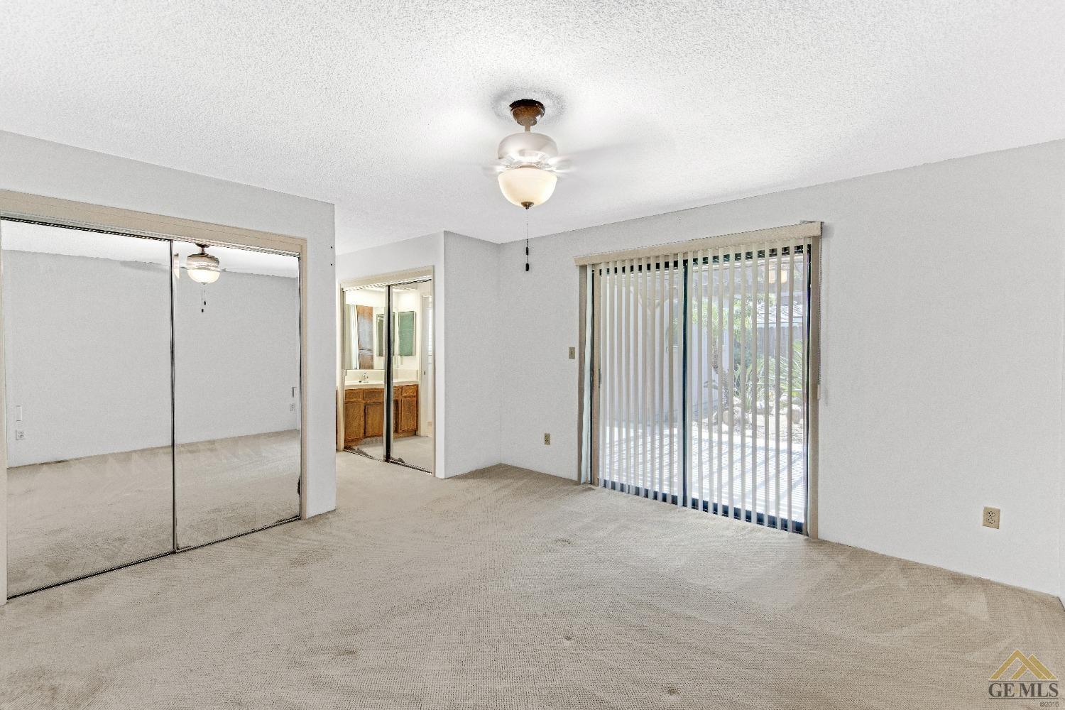 Undisclosed Address Bakersfield, CA 93311 - Photo 15 of 50 a view of empty room with ceiling fan