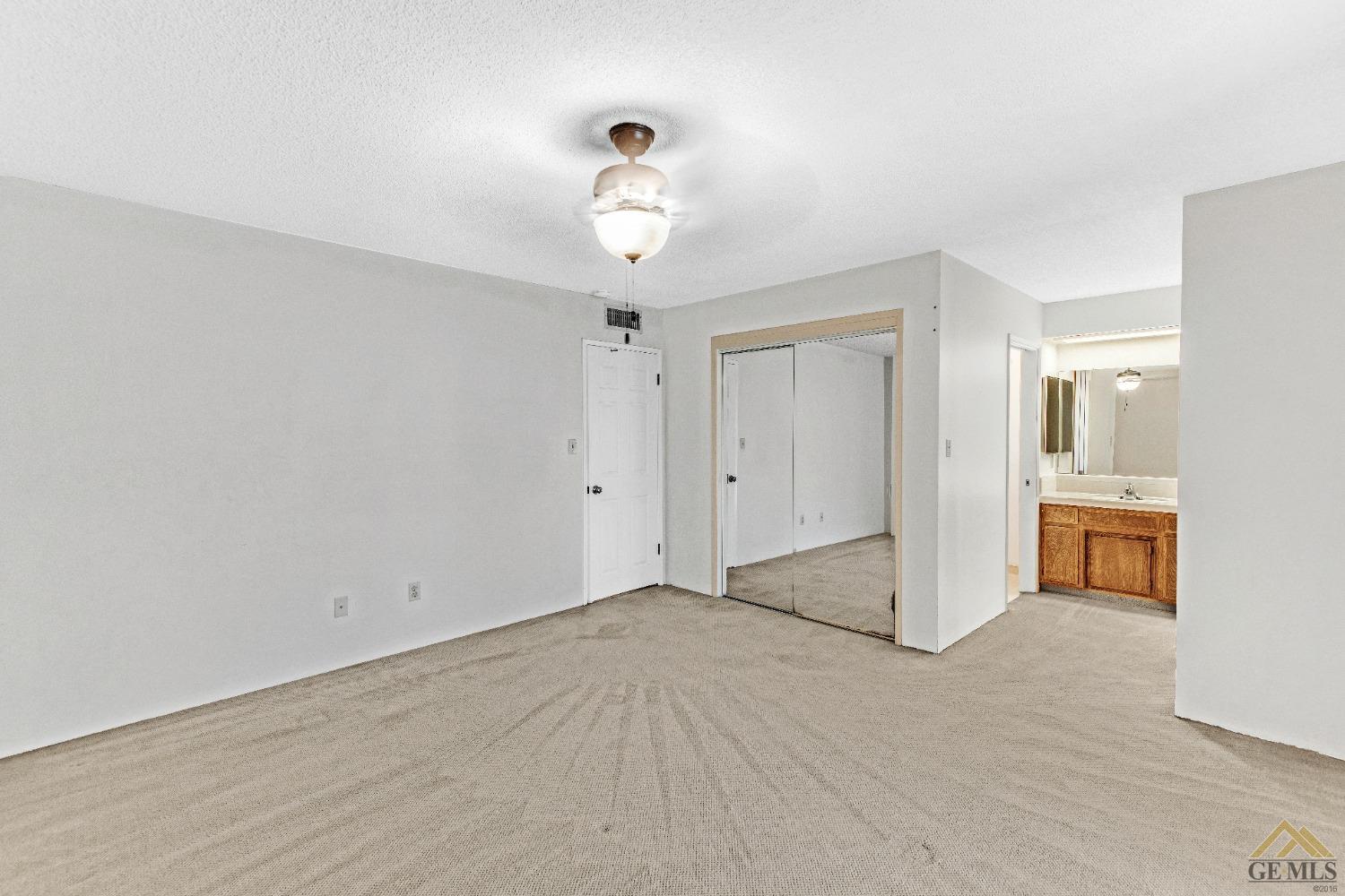 Undisclosed Address Bakersfield, CA 93311 - Photo 16 of 50 a view of an empty room with a bathroom