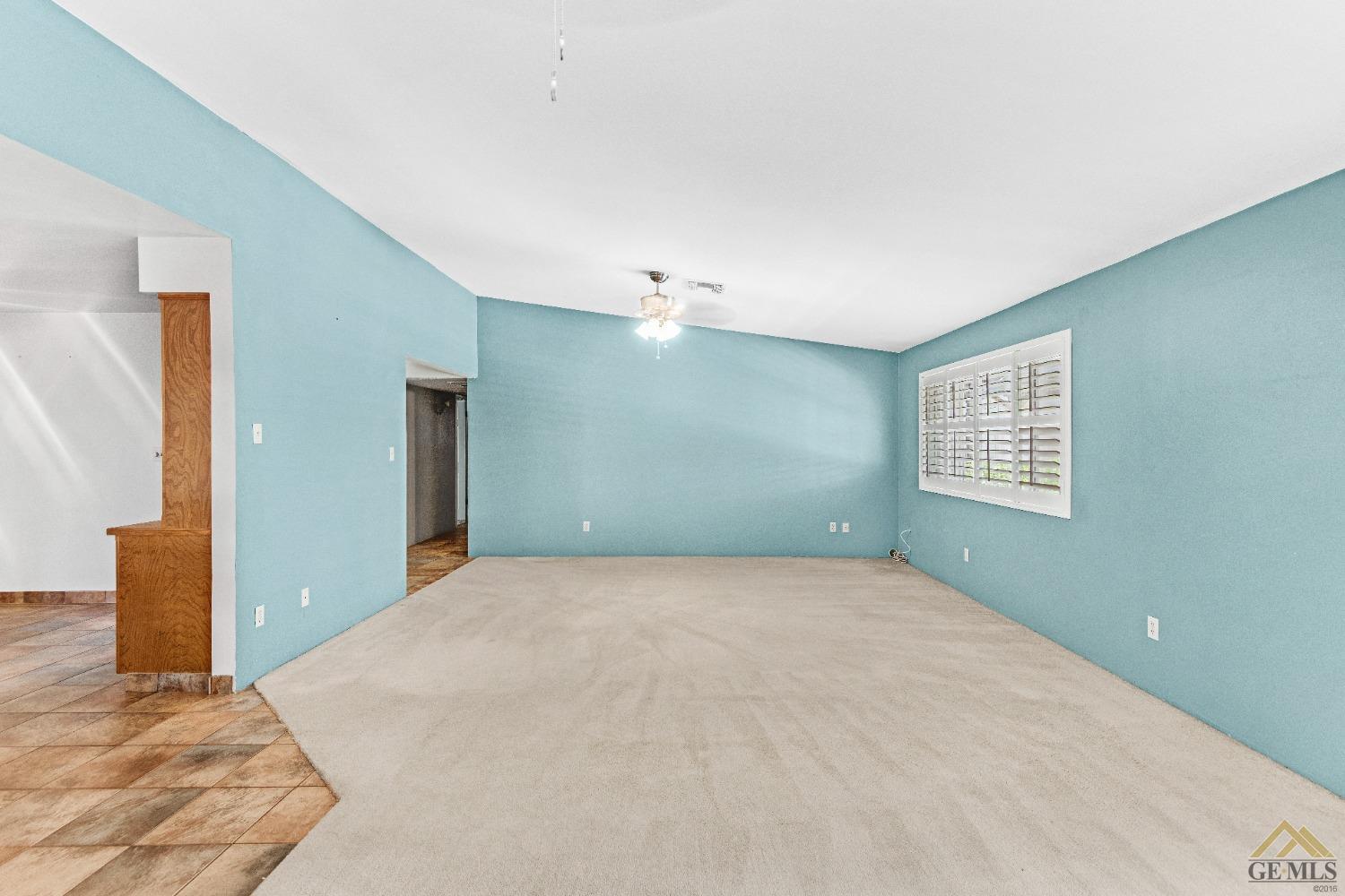 Undisclosed Address Bakersfield, CA 93311 - Photo 23 of 50 a view of an empty room with a window