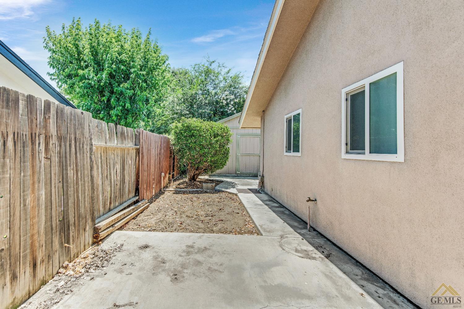 Undisclosed Address Bakersfield, CA 93311 - Photo 36 of 50 a view of a backyard with pathway