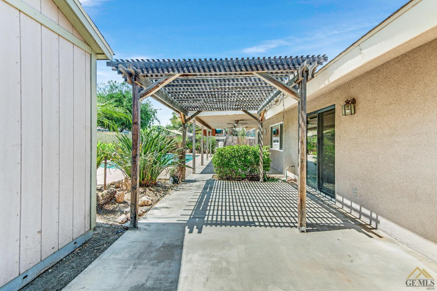 Undisclosed Address Bakersfield, CA 93311 - Photo 37 of 50 a view of a house with a porch