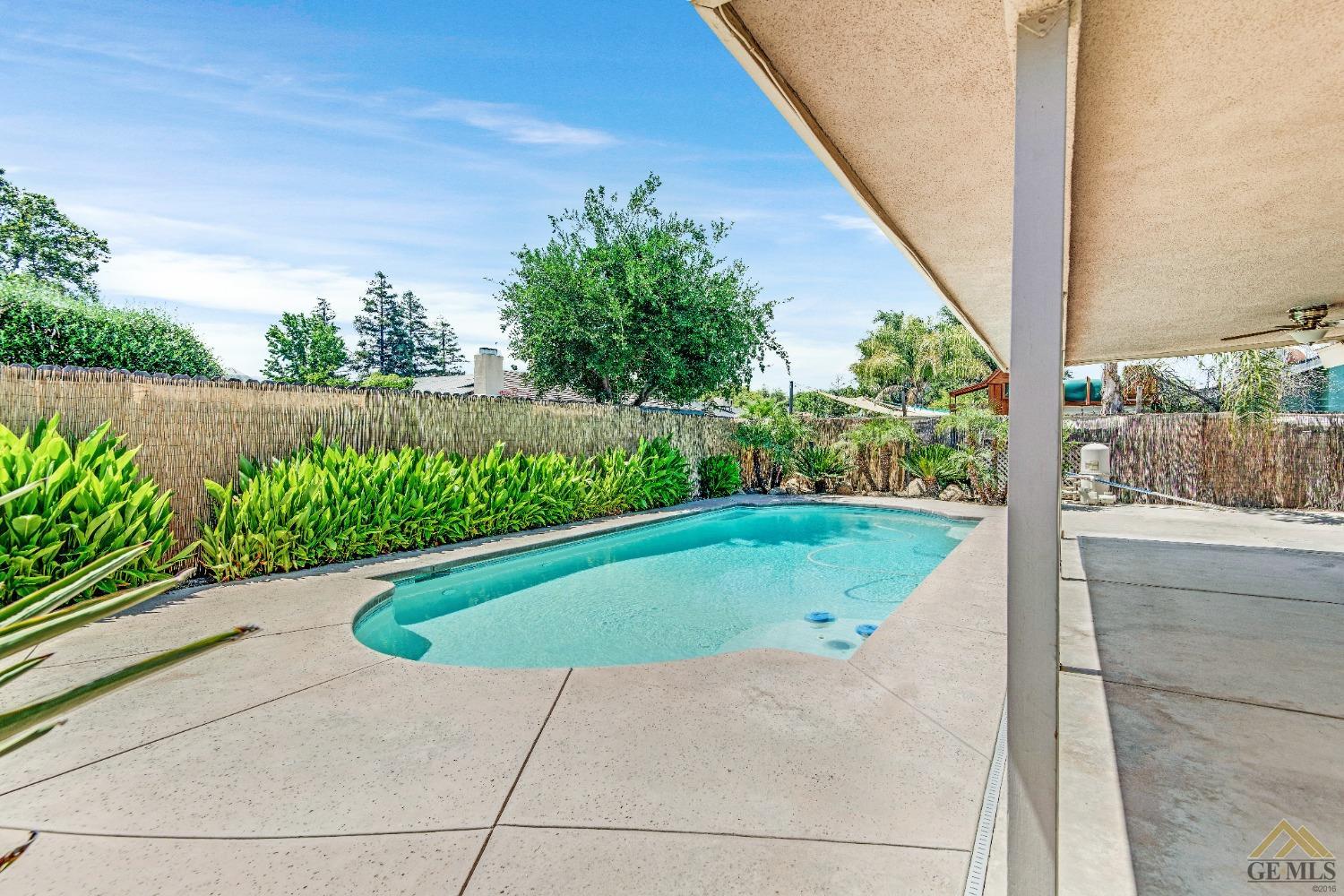Undisclosed Address Bakersfield, CA 93311 - Photo 38 of 50 a view of outdoor space and swimming pool