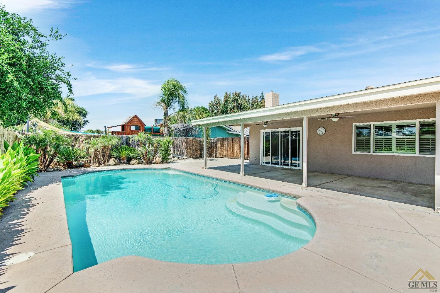 Undisclosed Address Bakersfield, CA 93311 - Photo 40 of 50 a view of a house with a backyard