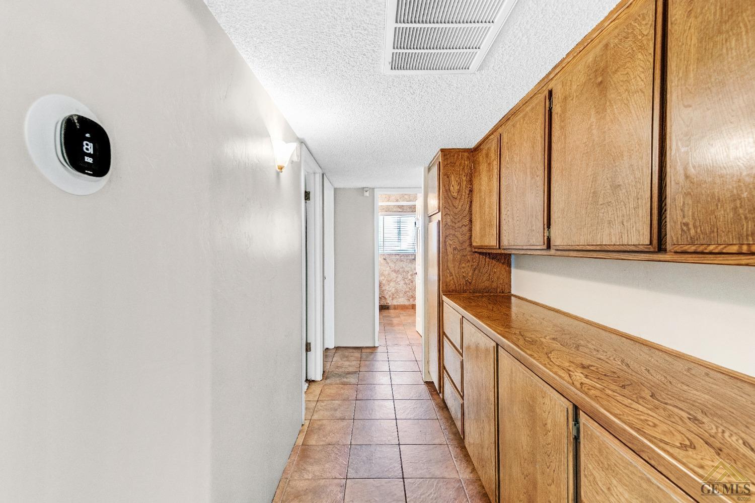 Undisclosed Address Bakersfield, CA 93311 - Photo 4 of 50 a view of a hallway