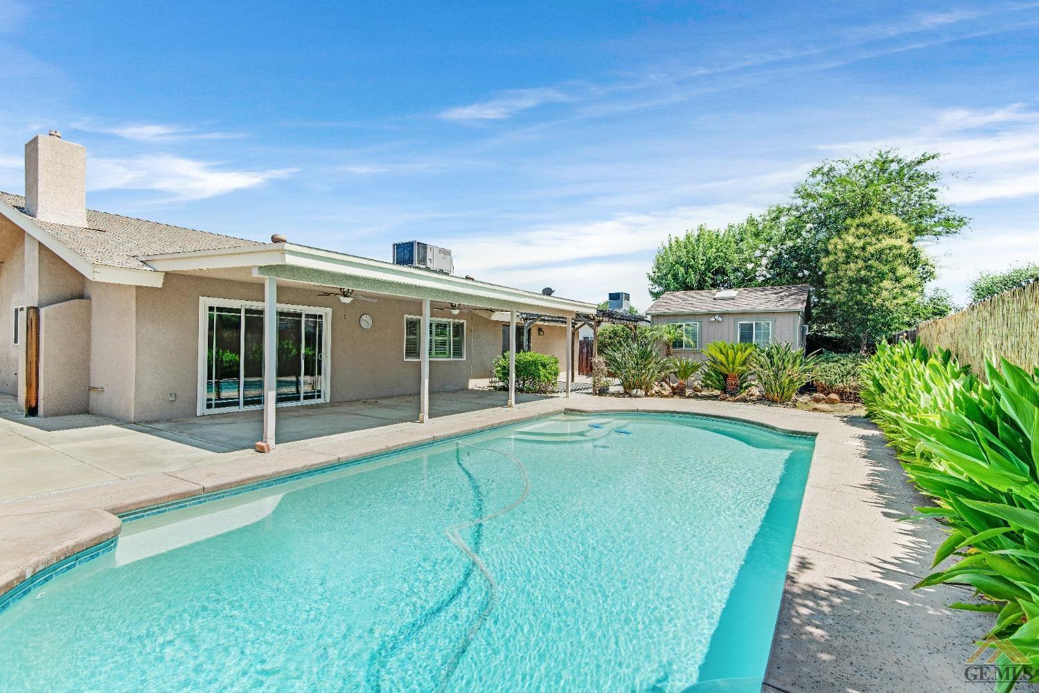 Undisclosed Address Bakersfield, CA 93311 - Photo 41 of 50 a view of house with swimming pool outdoor seating