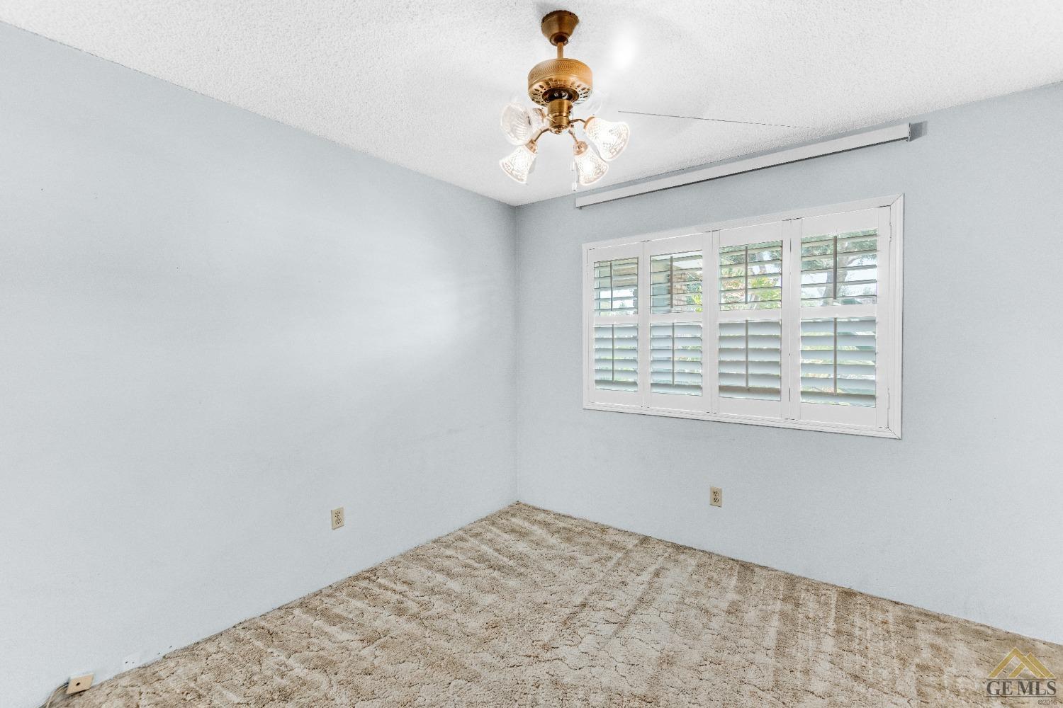 Undisclosed Address Bakersfield, CA 93311 - Photo 5 of 50 a view of an empty room with a window