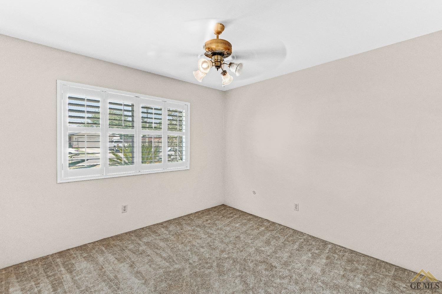Undisclosed Address Bakersfield, CA 93311 - Photo 9 of 50 an empty room with a window