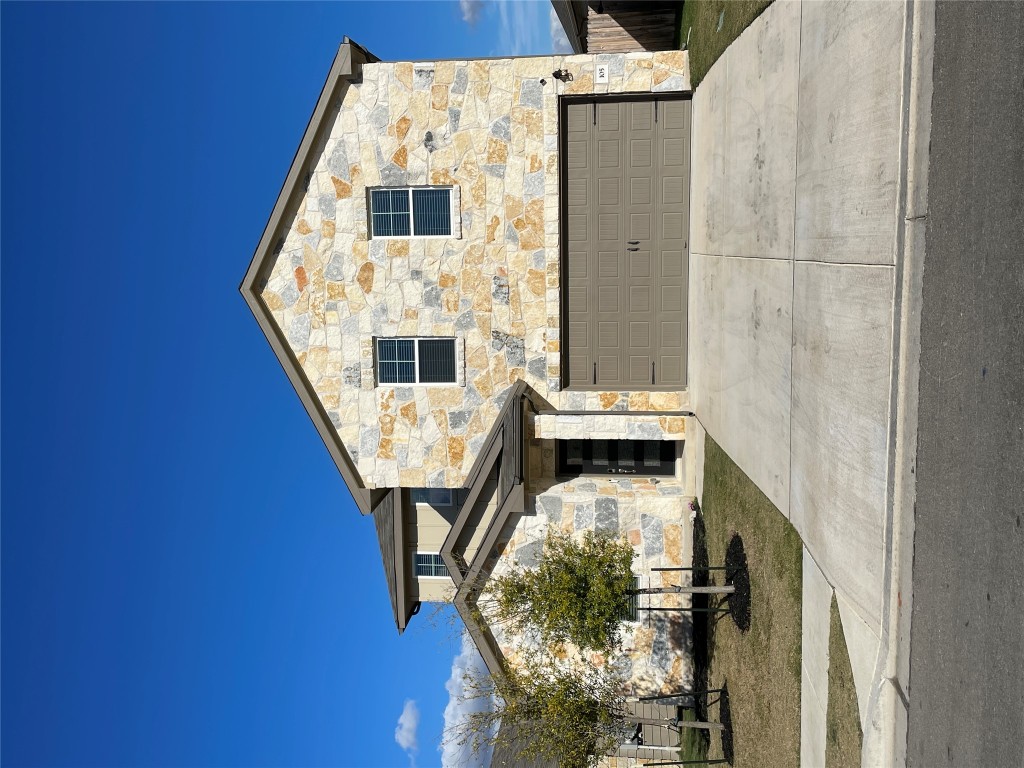 a view of a building with a street