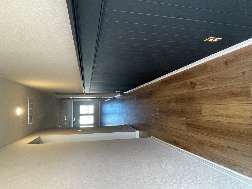 105 Sungrove Trail Georgetown, TX 78628 - Photo 11 of 18 a view of gallery with wooden floor