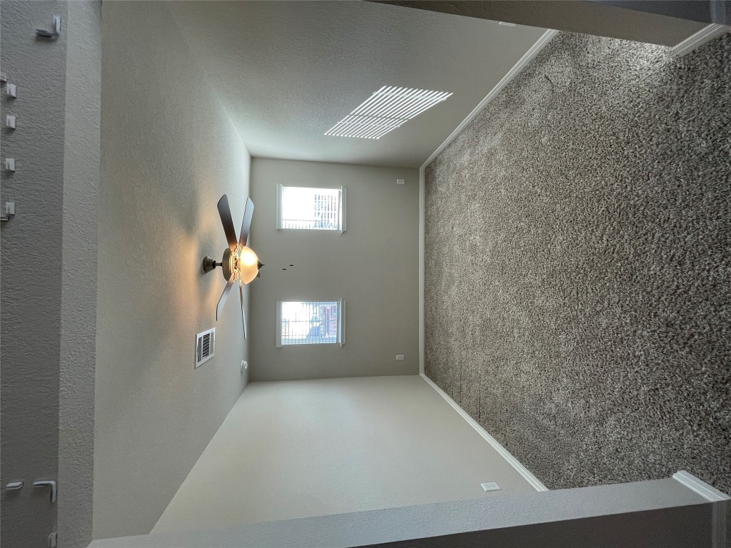 105 Sungrove Trail Georgetown, TX 78628 - Photo 13 of 18 a view of an empty room with a window