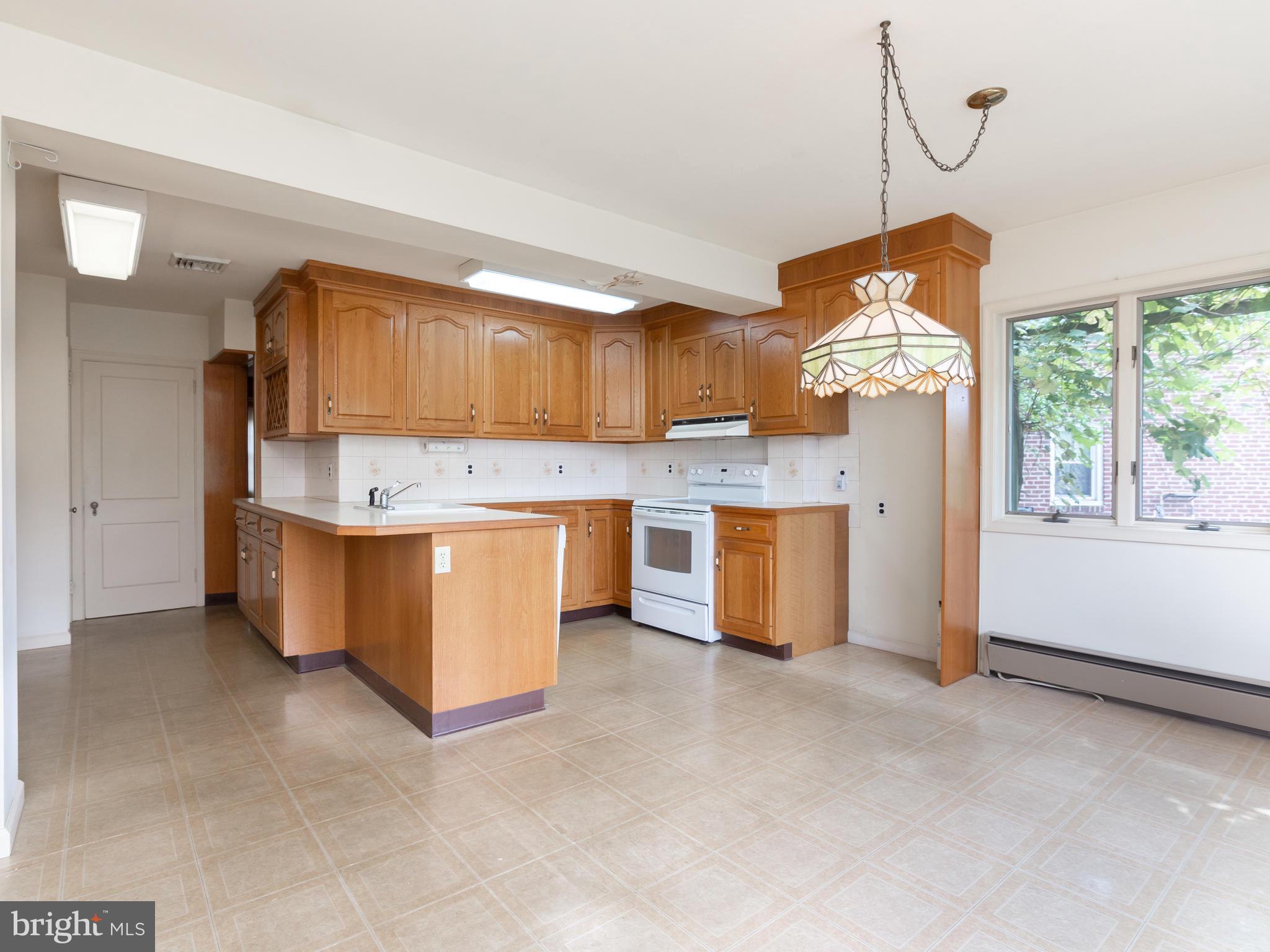 177 Friendship Road Drexel Hill, PA 19026 - Photo 9 of 20 Expanded Kitchen - Perfect entertainment space!