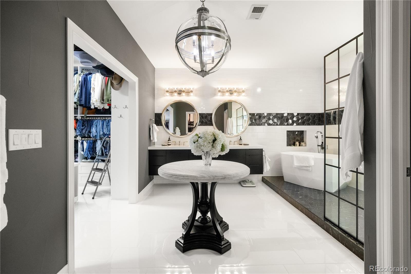 10785 Sundial Rim Road Highlands Ranch, CO 80126 - Photo 15 of 43 a view of living room with furniture and a large mirror