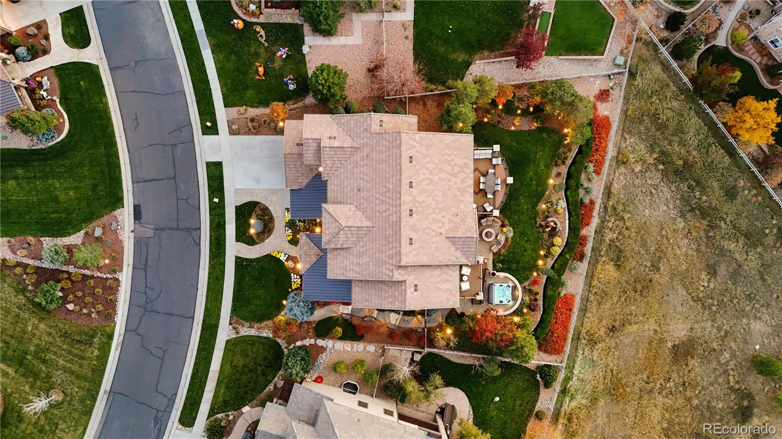 10785 Sundial Rim Road Highlands Ranch, CO 80126 - Photo 2 of 43 an aerial view of residential house with outdoor space and swimming pool