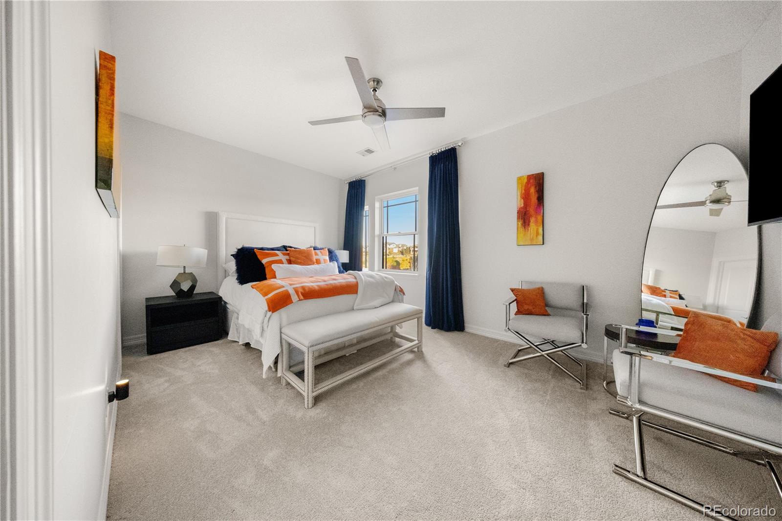 10785 Sundial Rim Road Highlands Ranch, CO 80126 - Photo 22 of 43 a bedroom with furniture and white walls