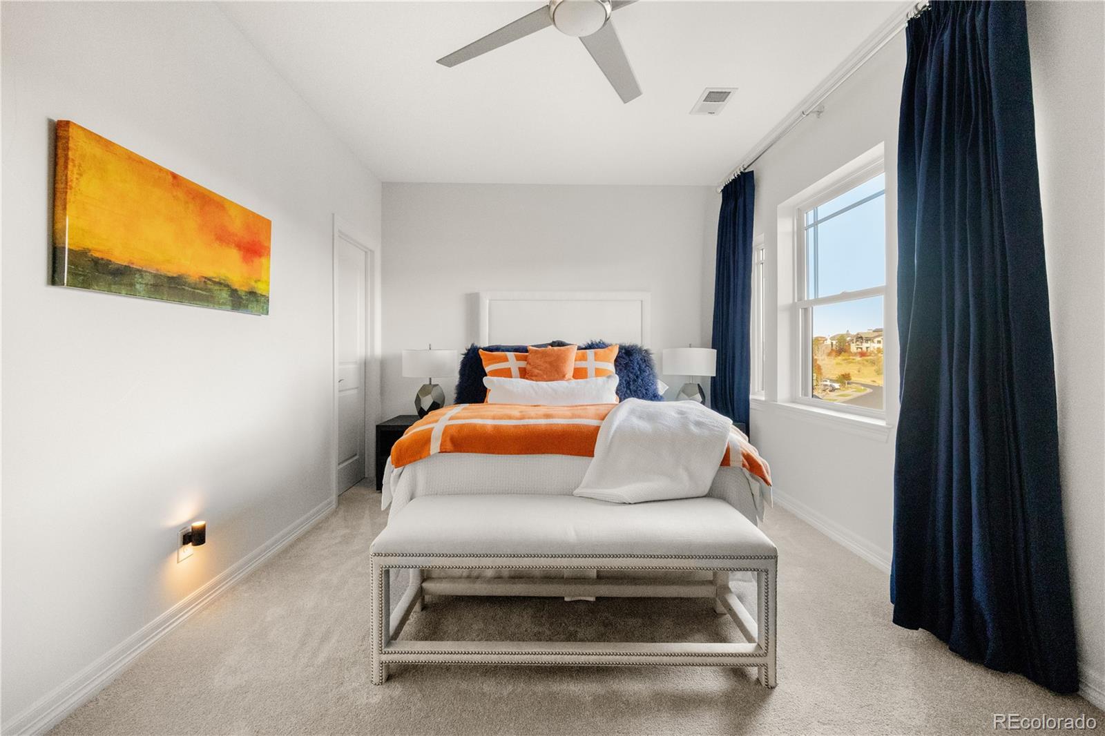 10785 Sundial Rim Road Highlands Ranch, CO 80126 - Photo 23 of 43 a bedroom with a bed and window