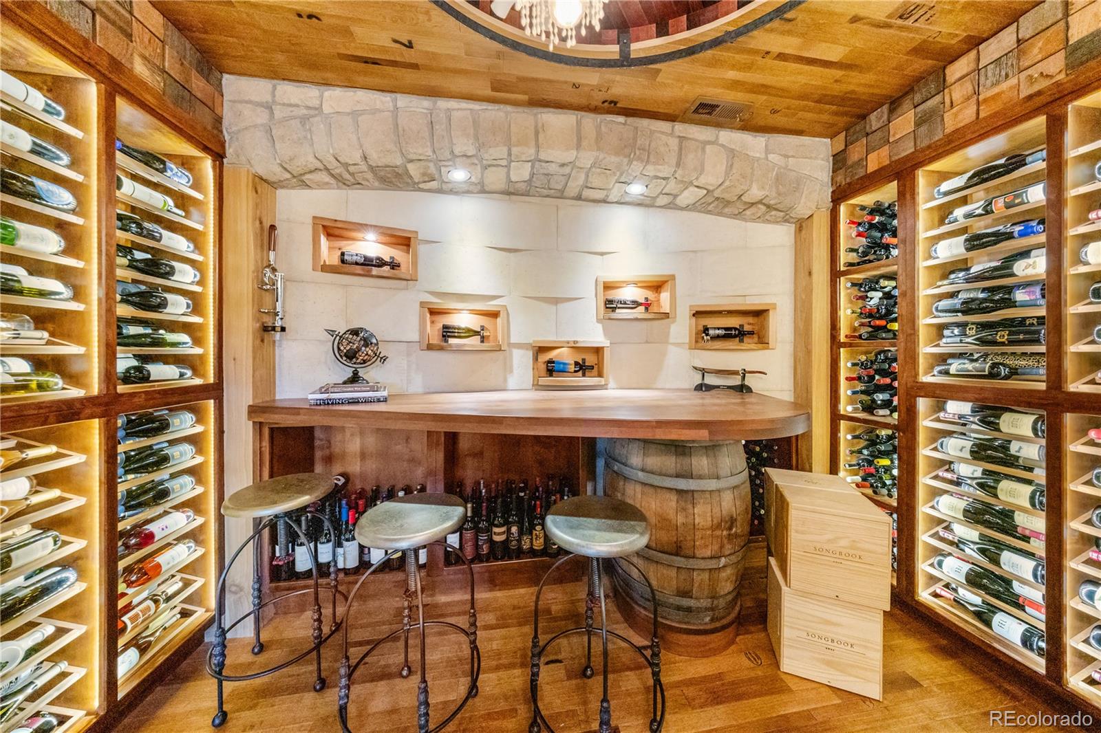 10785 Sundial Rim Road Highlands Ranch, CO 80126 - Photo 29 of 43 a dining table chair and cabinet in a room