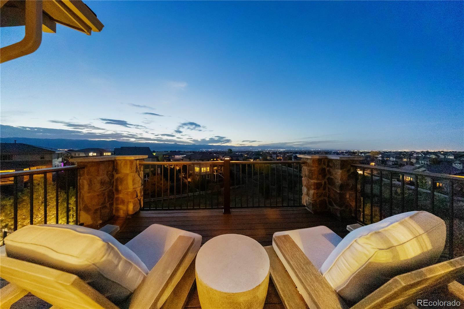 10785 Sundial Rim Road Highlands Ranch, CO 80126 - Photo 38 of 43 a balcony with table and chairs