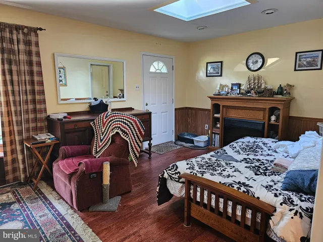 a bedroom with a bed and a table in it