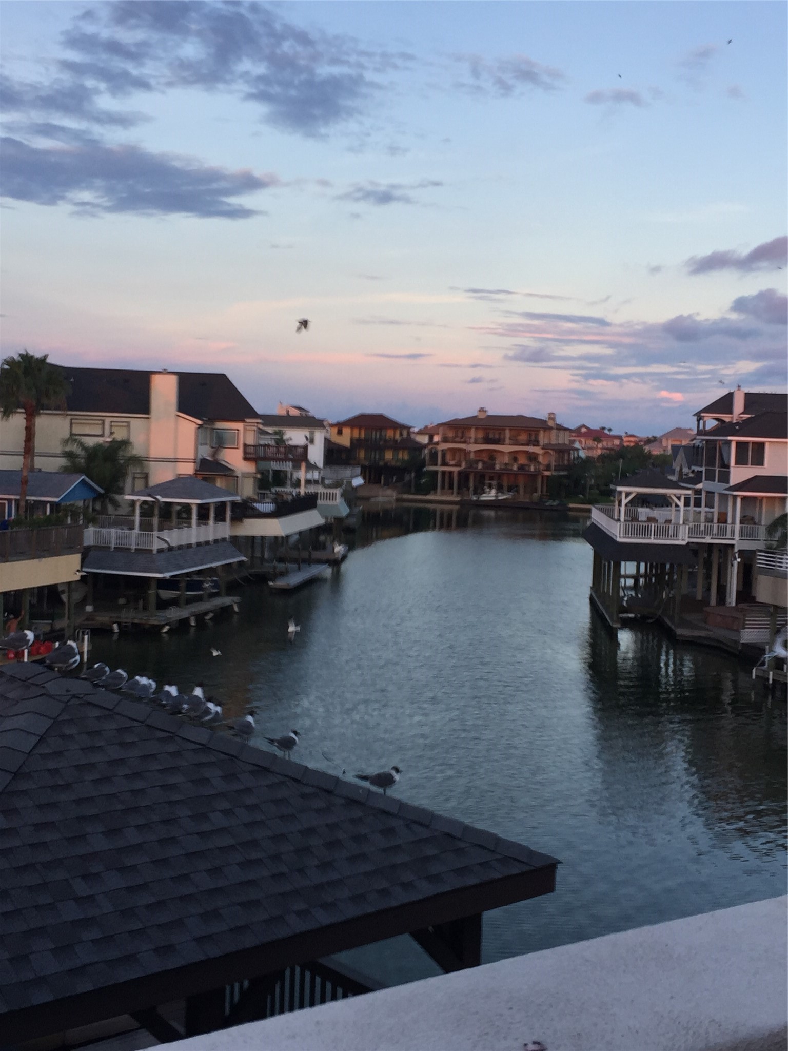 106 Isles End Road Tiki Island, TX 77554 - Photo 19 of 44 a view of a lake
