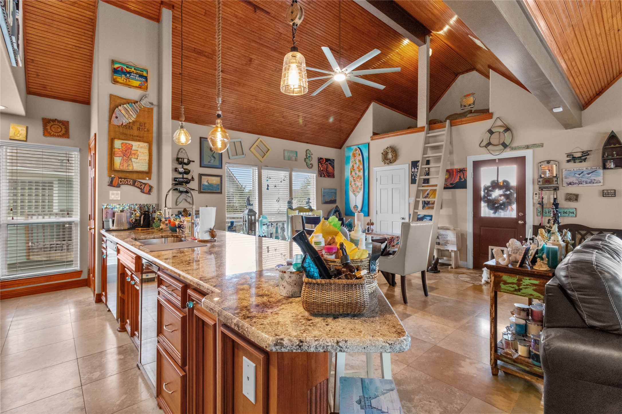 106 Isles End Road Tiki Island, TX 77554 - Photo 2 of 44 a view of a patio with table and chairs