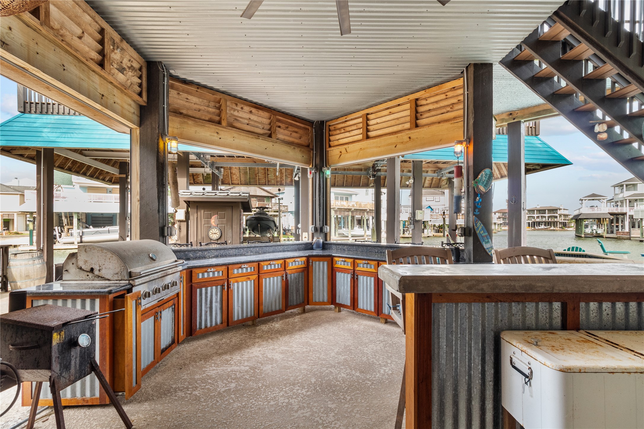 106 Isles End Road Tiki Island, TX 77554 - Photo 27 of 44 a view of an outdoor kitchen