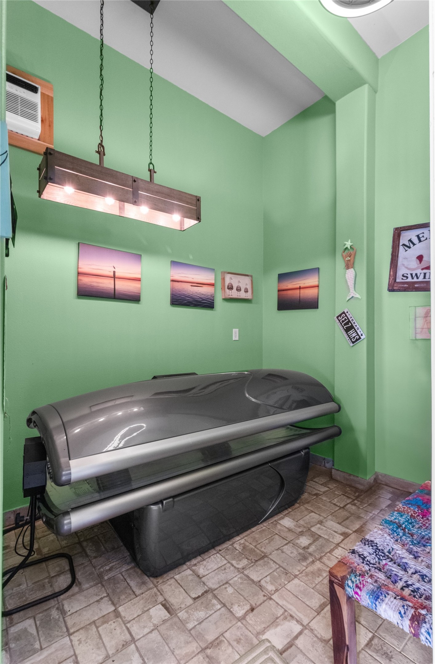 106 Isles End Road Tiki Island, TX 77554 - Photo 29 of 44 a room with cabinets and furniture