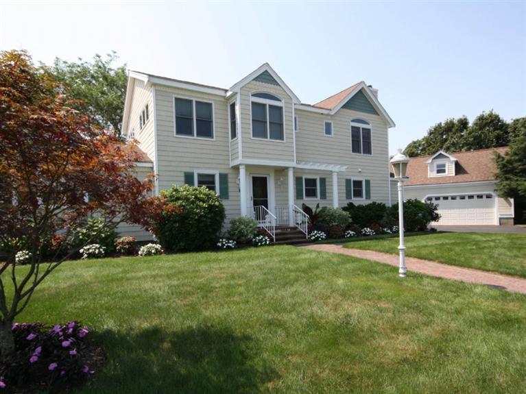 1 Sias Point Road Buzzards Bay, MA 02532 - Photo 1 of 29 a view of a house with a yard and a garden