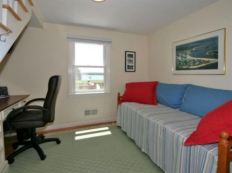 1 Sias Point Road Buzzards Bay, MA 02532 - Photo 13 of 29 a bedroom with furniture and a window