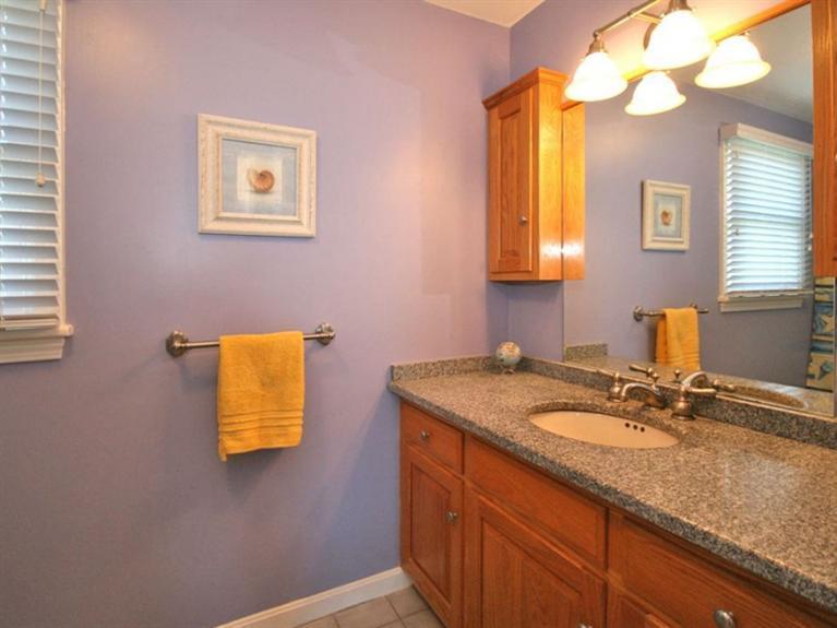 1 Sias Point Road Buzzards Bay, MA 02532 - Photo 8 of 29 a bathroom with a granite countertop sink and a mirror