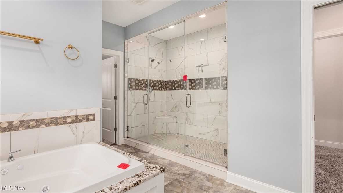 4641 Foote Road Medina, OH 44256 - Photo 26 of 46 Bathroom featuring a whirlpool tub and a shower stall