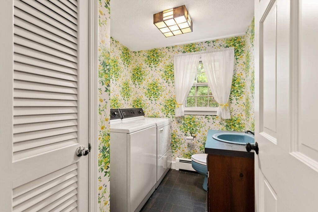 8 Brookhead Avenue Beverly, MA 01915 - Photo 11 of 35 a view of a hallway with a dining table and a window