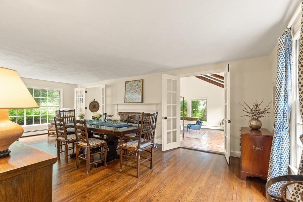 8 Brookhead Avenue Beverly, MA 01915 - Photo 12 of 35 a view of a dining room with furniture window and wooden floor
