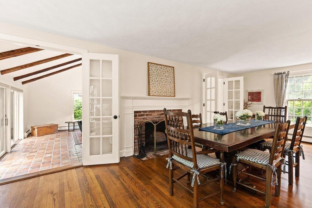 8 Brookhead Avenue Beverly, MA 01915 - Photo 14 of 35 a view of a dining room with furniture and wooden floor