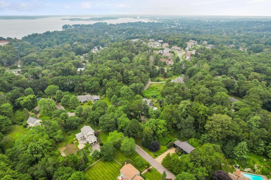 8 Brookhead Avenue Beverly, MA 01915 - Photo 32 of 35 an aerial view of a house with a yard