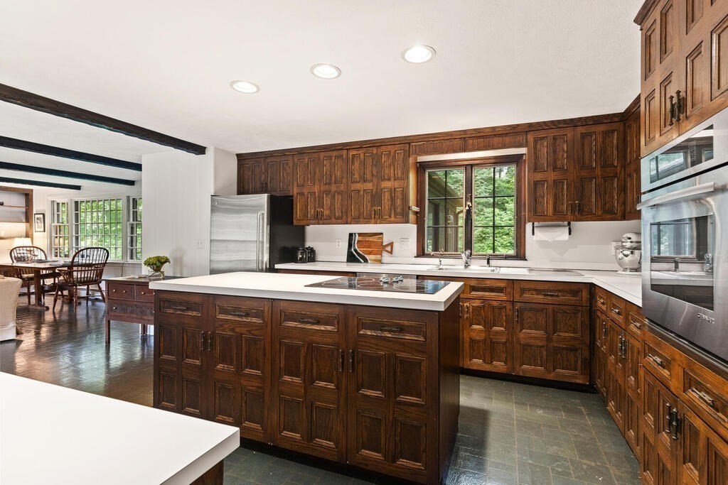 8 Brookhead Avenue Beverly, MA 01915 - Photo 4 of 35 a kitchen with a sink and cabinets