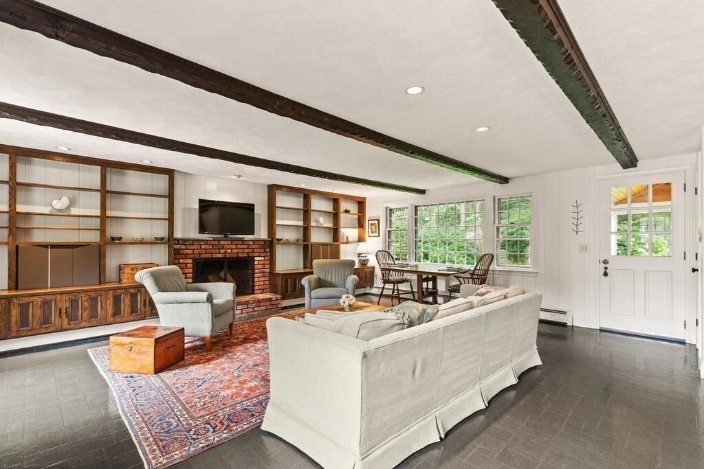 8 Brookhead Avenue Beverly, MA 01915 - Photo 7 of 35 a living room with furniture flat screen tv and a large window