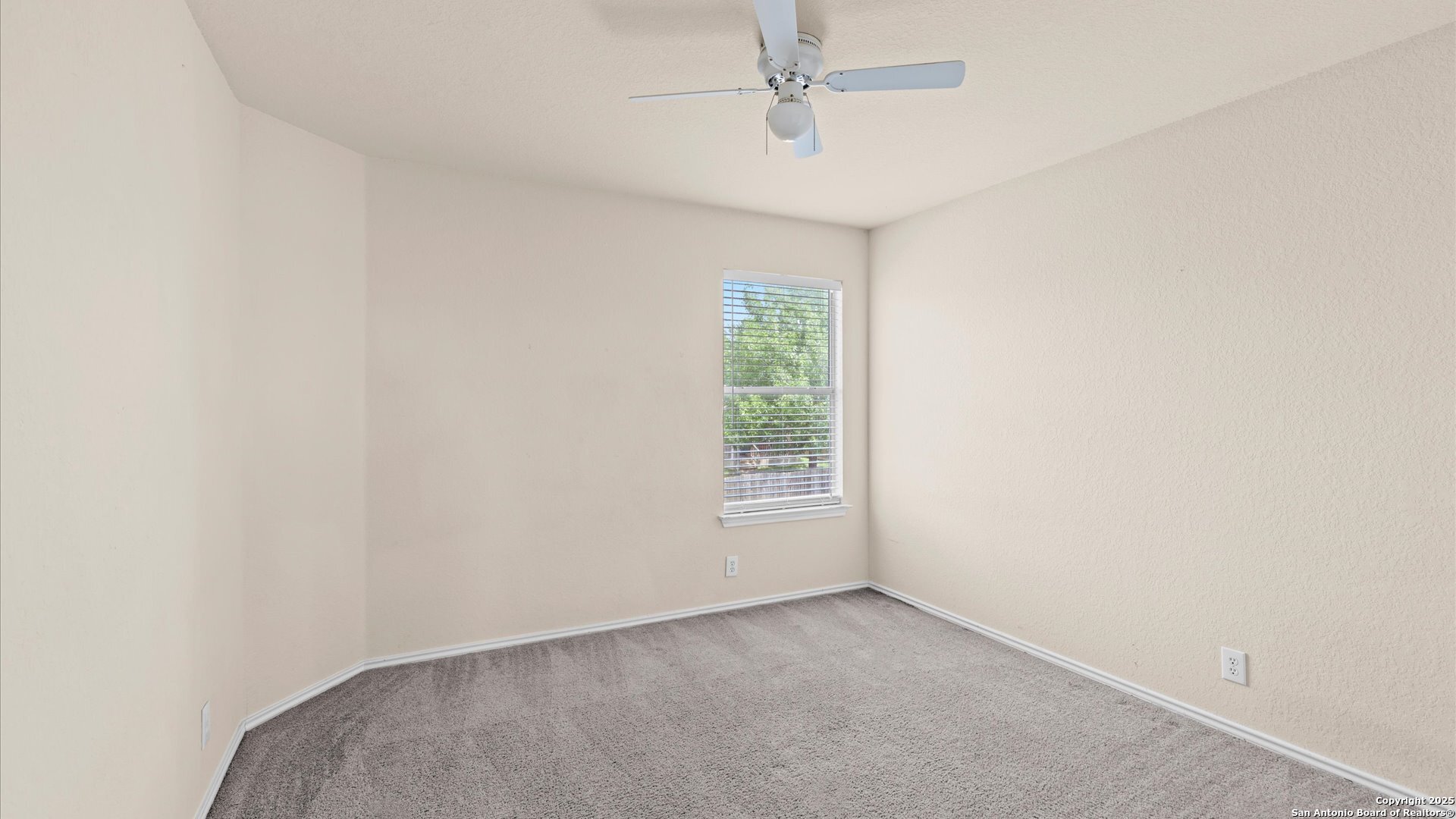 128 Pilot Cibolo, TX 78108 - Photo 12 of 22 an empty room with a window