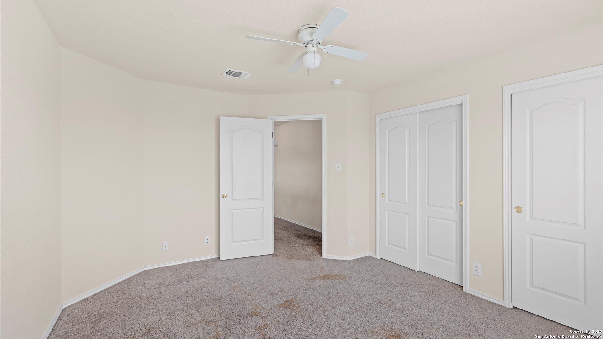 128 Pilot Cibolo, TX 78108 - Photo 15 of 22 an empty room with a ceiling fan and a window