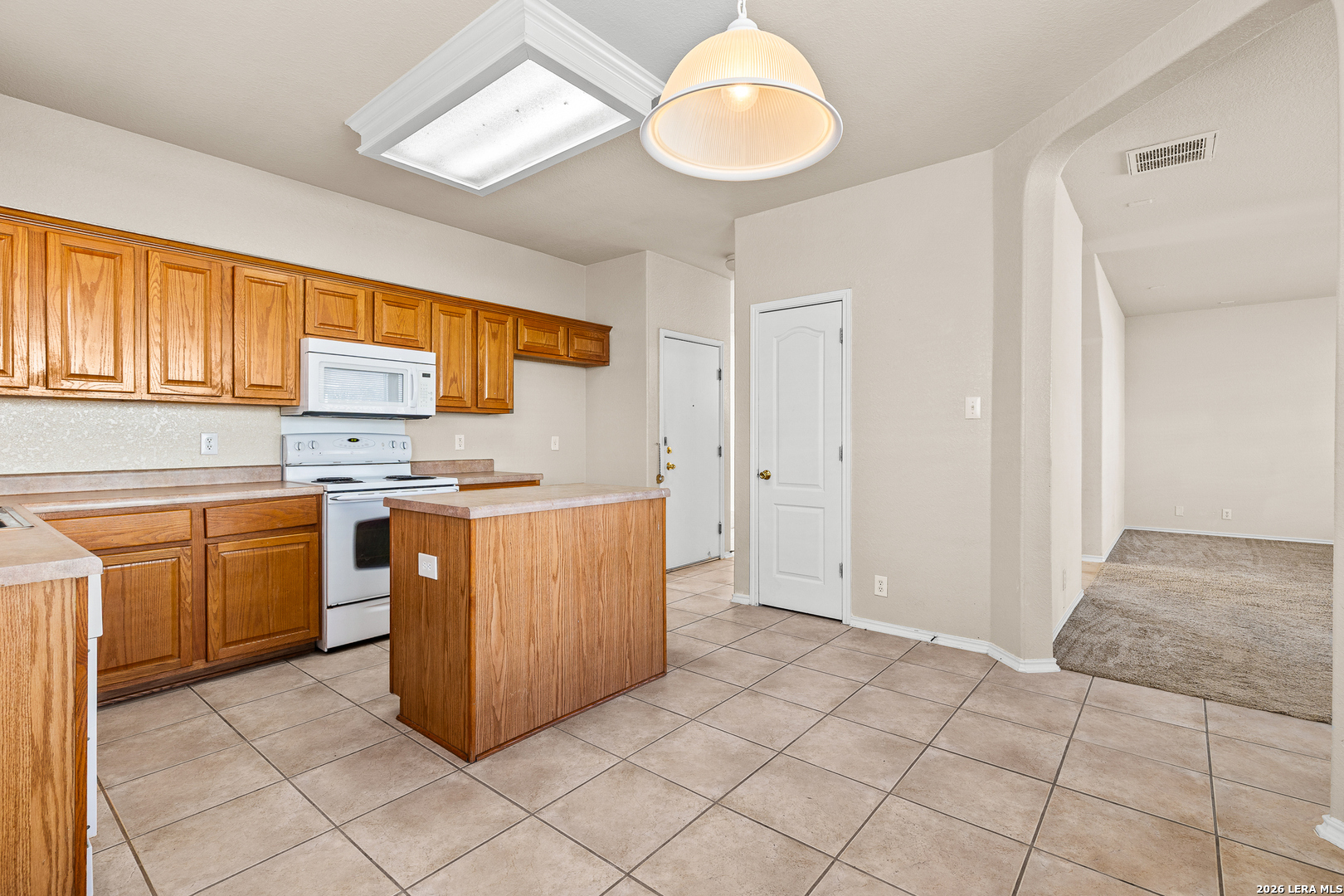 128 Pilot Cibolo, TX 78108 - Photo 19 of 49 a kitchen with stainless steel appliances granite countertop a stove sink and cabinets