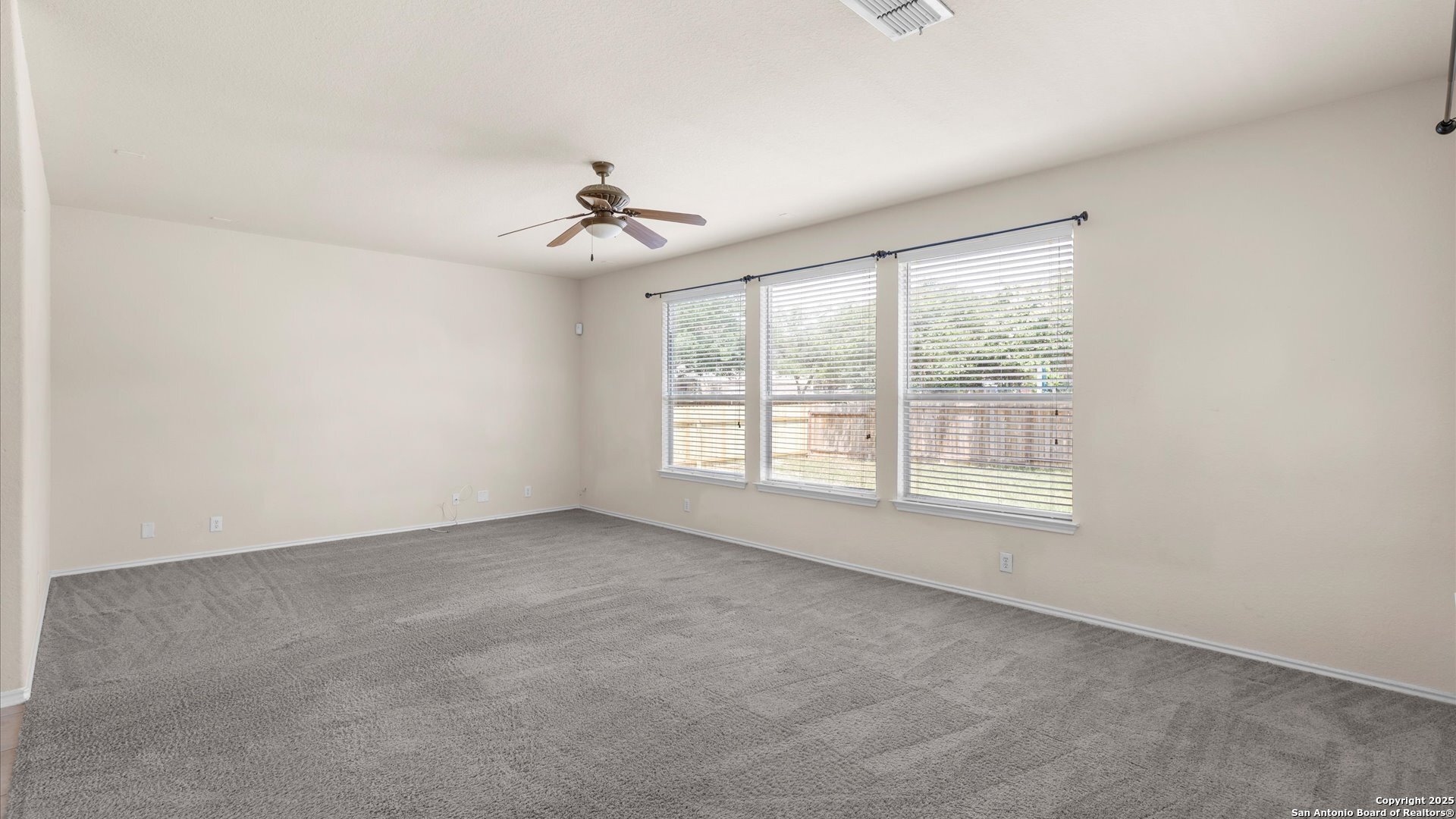 128 Pilot Cibolo, TX 78108 - Photo 20 of 22 a view of an empty room with a window