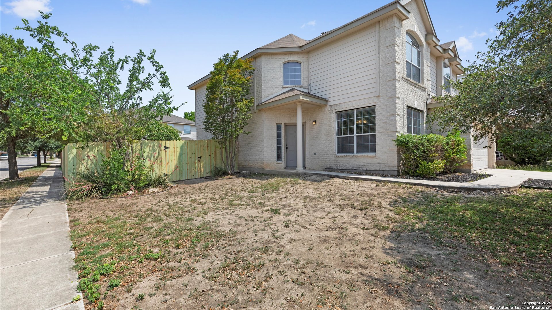 128 Pilot Cibolo, TX 78108 - Photo 2 of 22 a front view of a house with garden