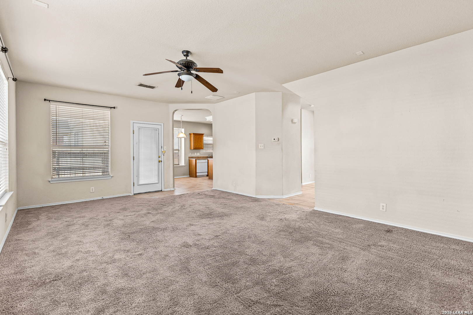 128 Pilot Cibolo, TX 78108 - Photo 23 of 49 an empty room with windows and fan