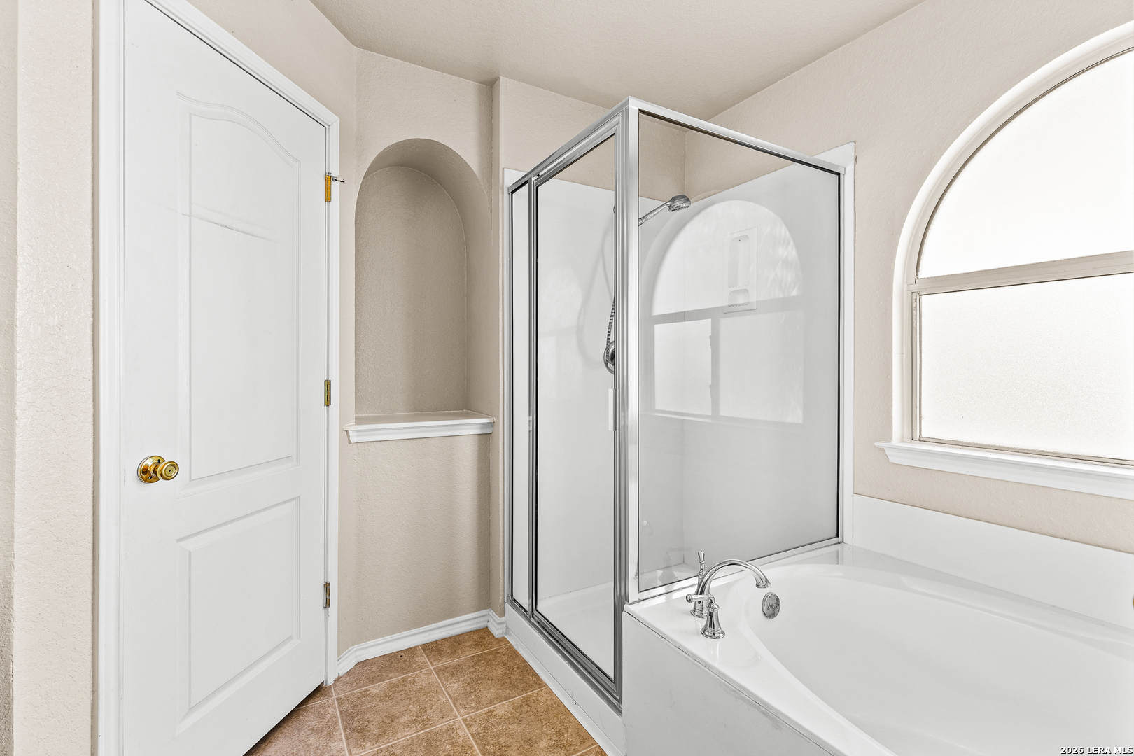 128 Pilot Cibolo, TX 78108 - Photo 28 of 49 a bathroom with a tub and shower