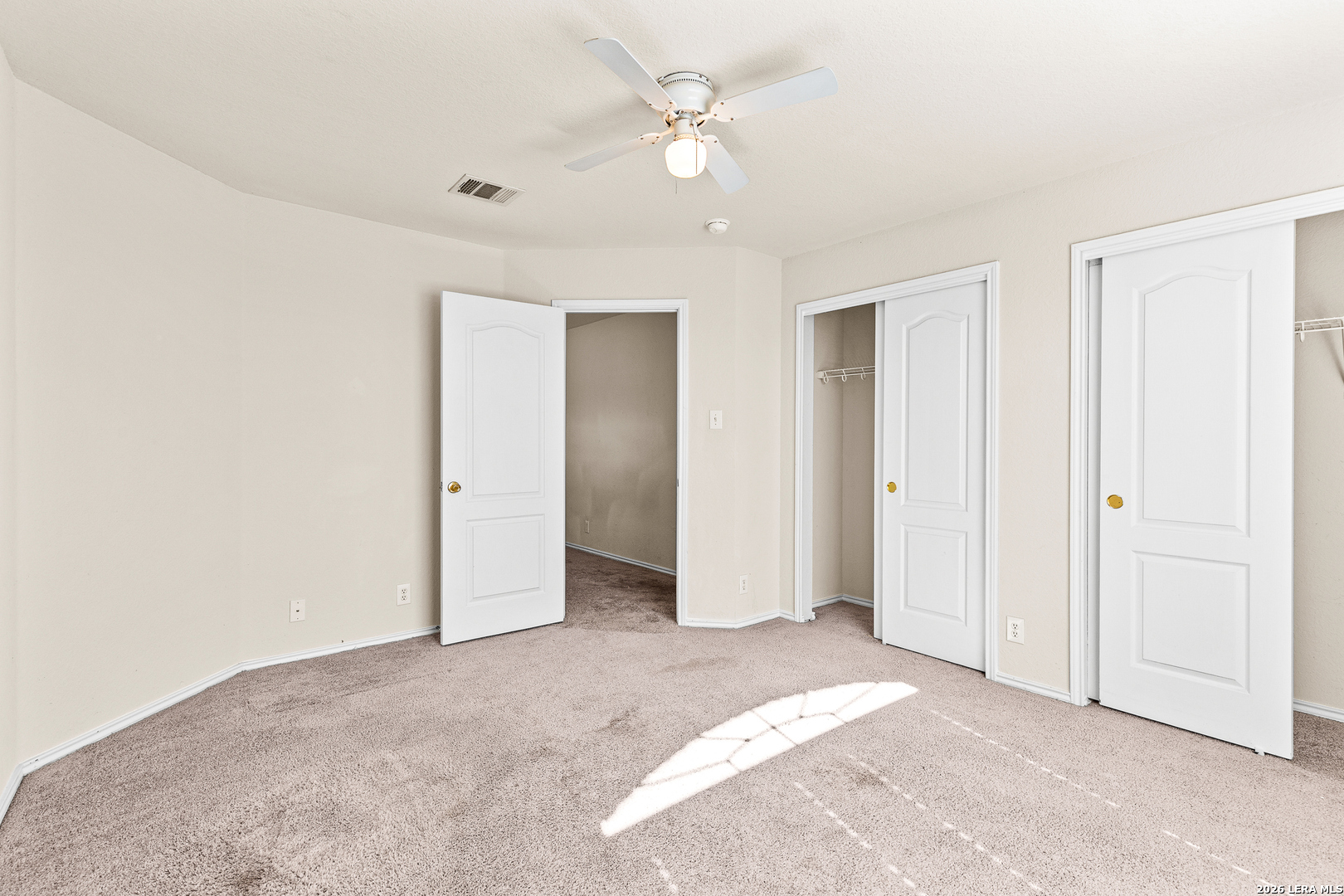 128 Pilot Cibolo, TX 78108 - Photo 31 of 49 an empty room with closet and a ceiling fan