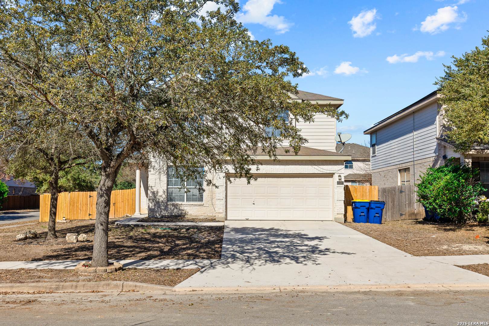 128 Pilot Cibolo, TX 78108 - Photo 5 of 49 a front view of a house with a yard
