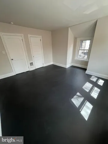 a view of an empty room with window