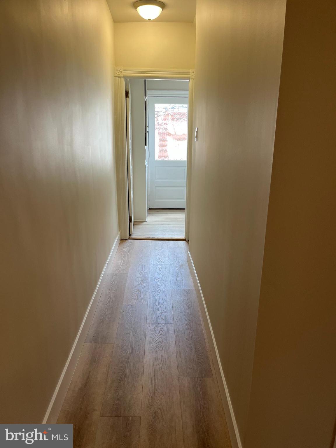 339 Chestnut Street, Unit 2 Pottstown, PA 19464 - Photo 4 of 19 a view of a hallway with wooden floor
